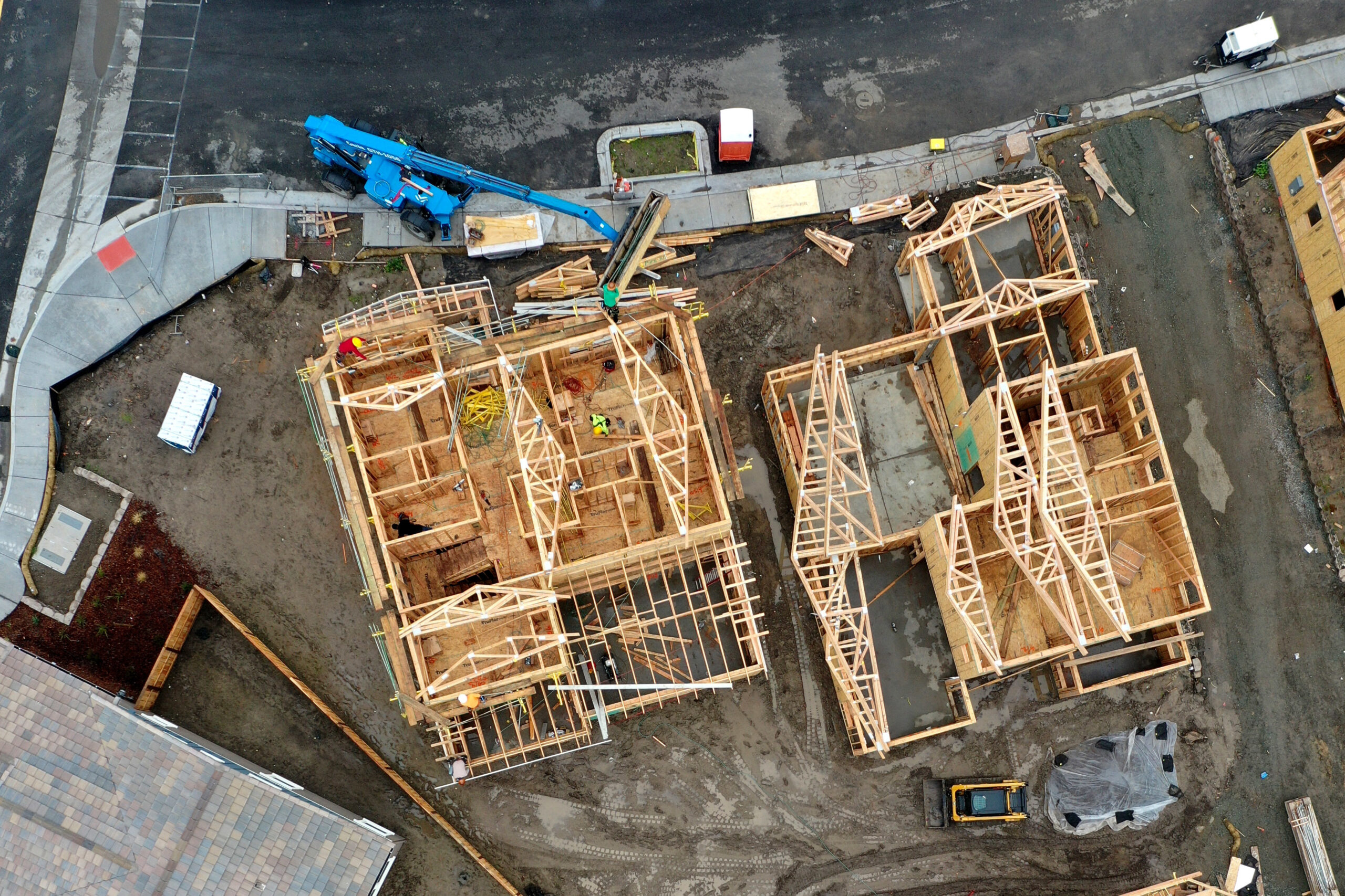 An aerial view of homes under construction at a housing development on January 31, 2019 in Petaluma, Calif. As housing prices surge around the country, Democratic presidential candidates are offering plans to address the shortage of affordable homes and apartment